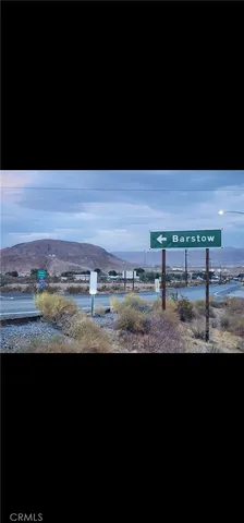 a view of a lake with a big yard