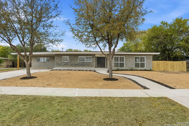 front view of a house with a patio