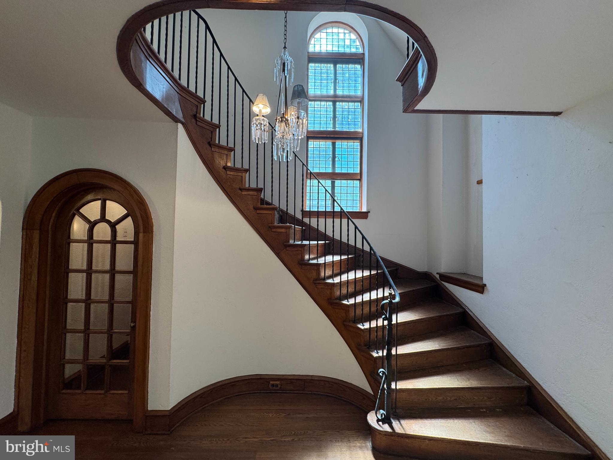 1217 Medford Road Wynnewood, PA 19096 - Photo 7 of 92 Grand Staircase Over Vestibule Door to Main Entry