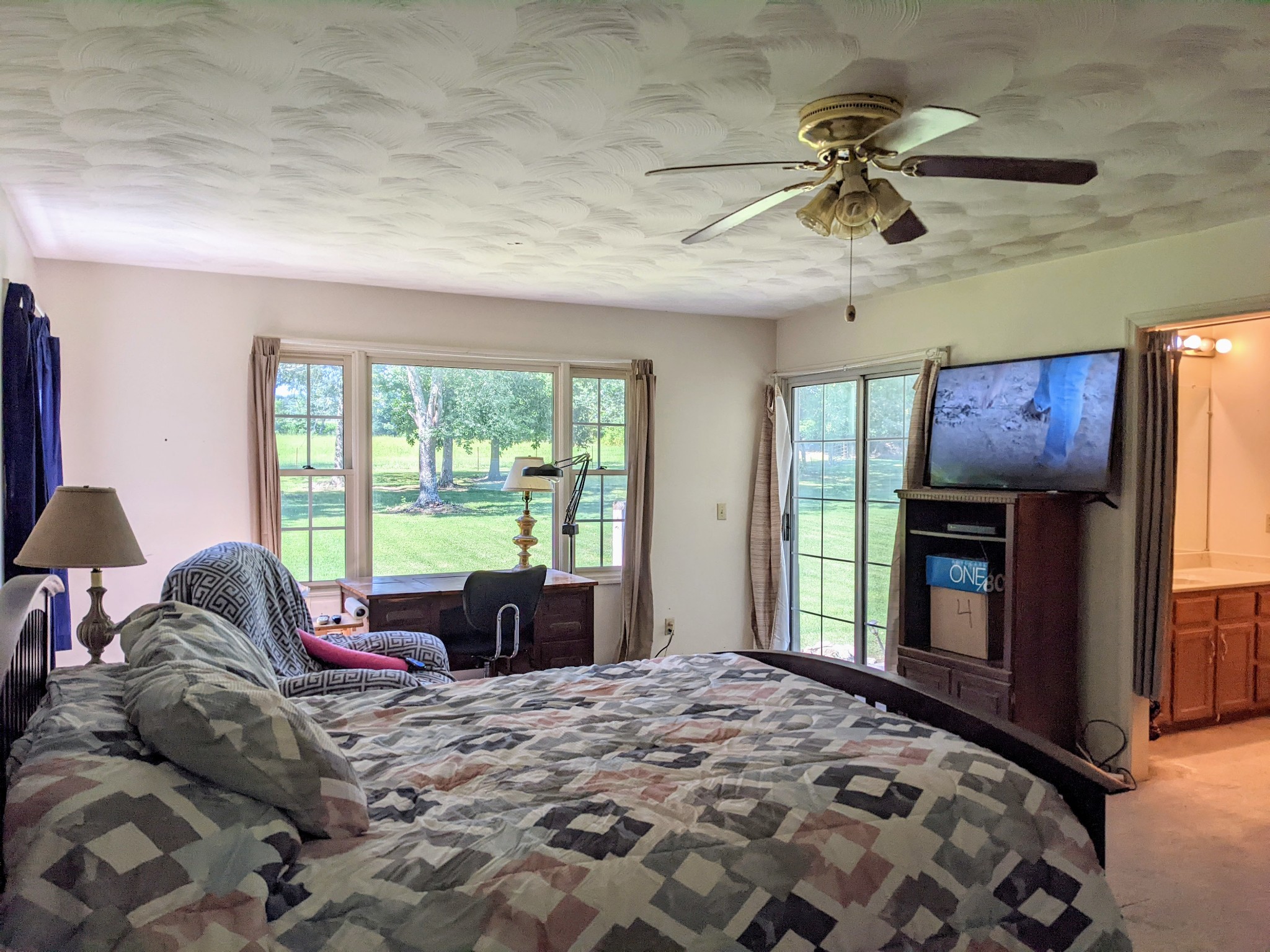 1843 Sainville Road Manchester, TN 37355 - Photo 29 of 32 a bed room with a bed and a television