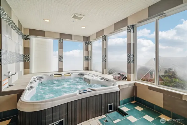 a bathroom with a double vanity sink and mirror