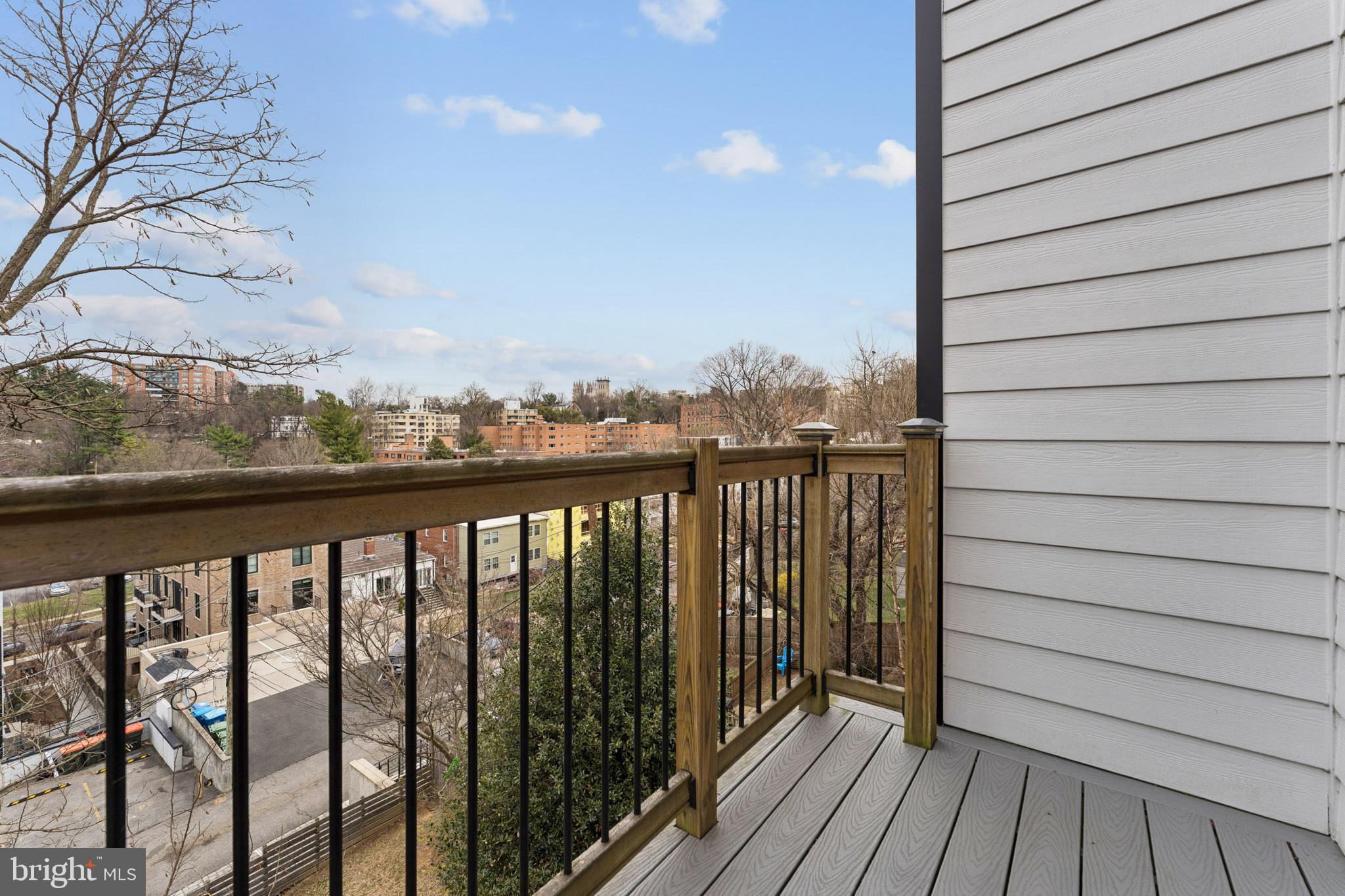 4017 Davis Place Northwest, Unit 7 Washington, DC 20007 - Photo 23 of 39 a view of balcony with wooden floor