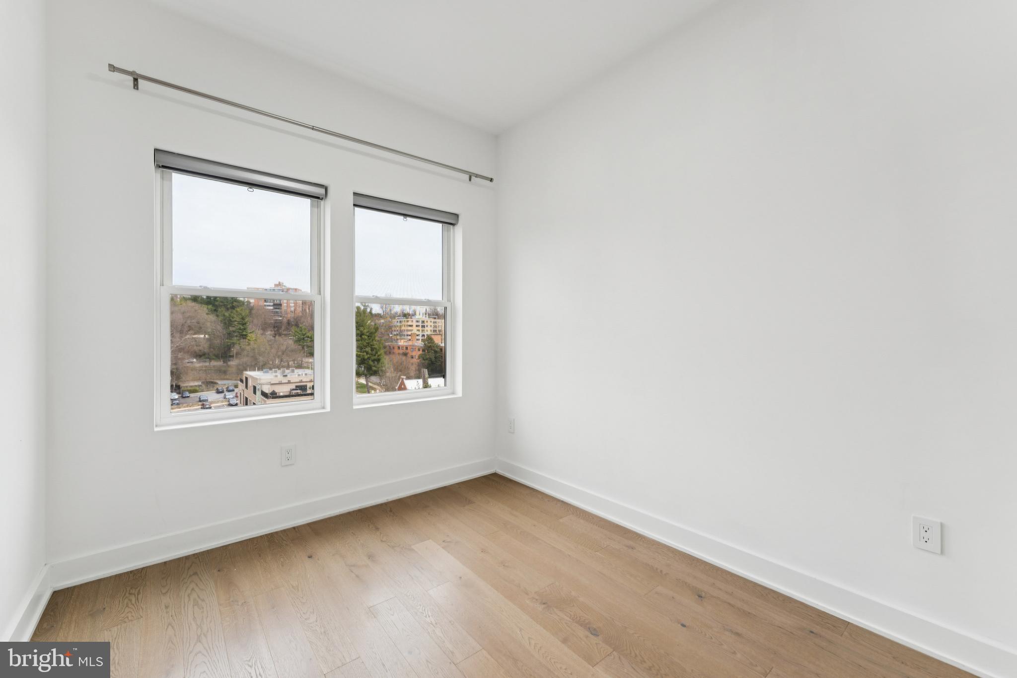 4017 Davis Place Northwest, Unit 7 Washington, DC 20007 - Photo 25 of 39 an empty room with a window