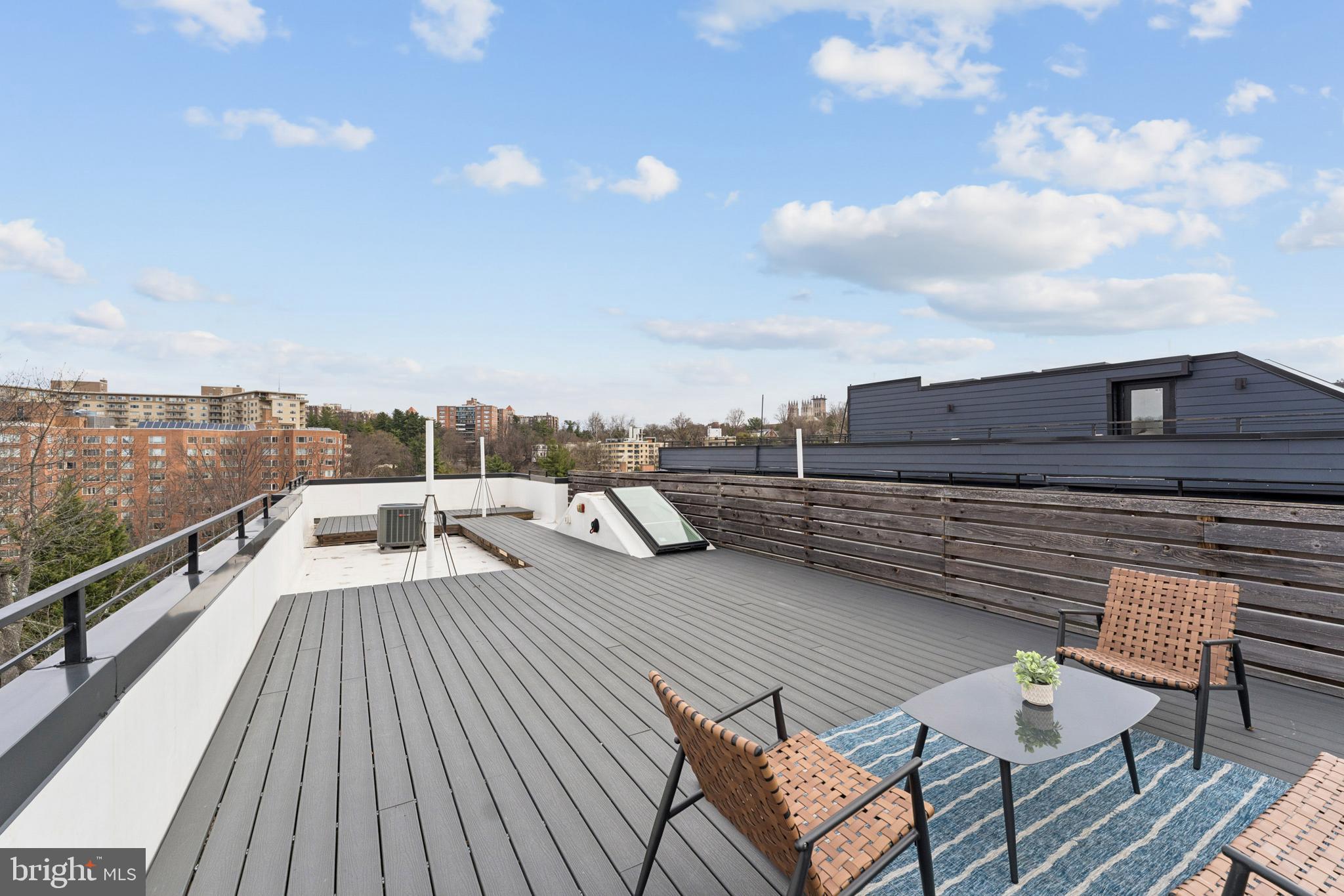 4017 Davis Place Northwest, Unit 7 Washington, DC 20007 - Photo 29 of 39 a view of roof deck with patio