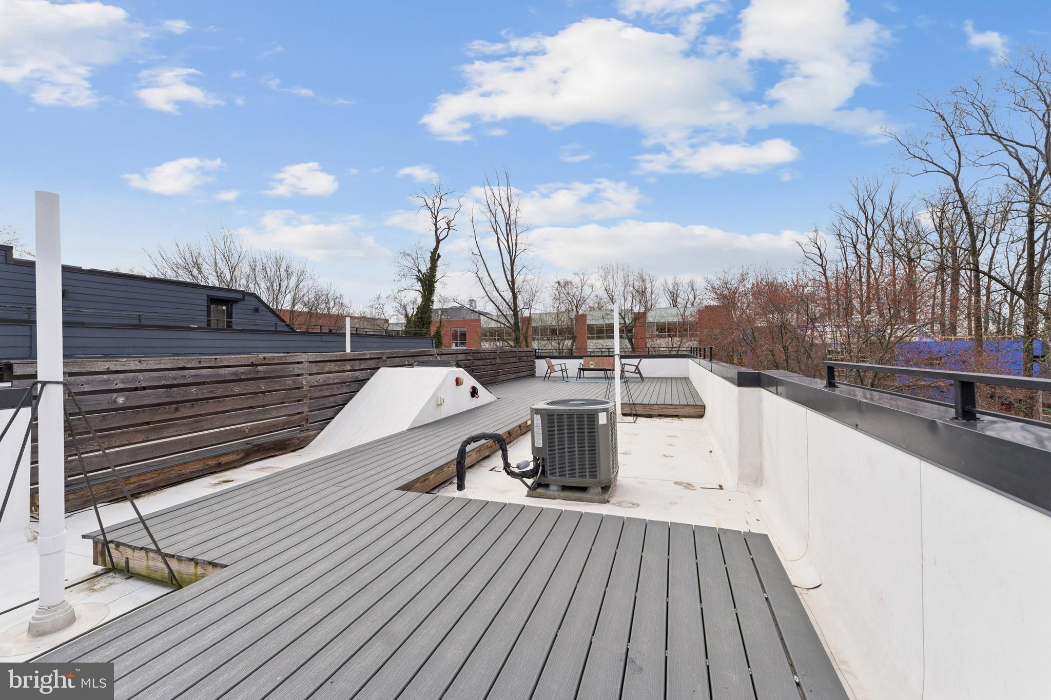 4017 Davis Place Northwest, Unit 7 Washington, DC 20007 - Photo 30 of 39 a view of a terrace with sky view