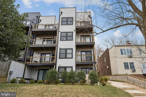 a view of a building with a yard