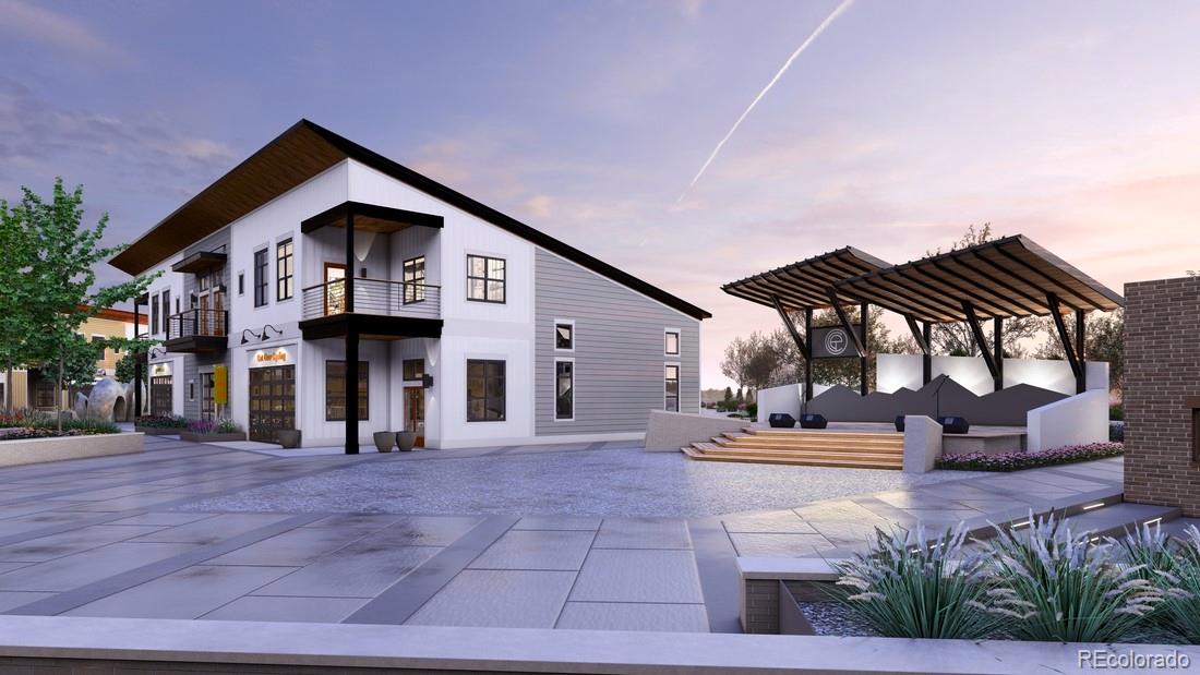 665 Skyhook Street Erie, CO 80516 - Photo 17 of 20 a front view of a house with a yard