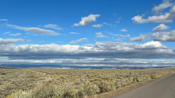 a view of mountain view with mountains in the background