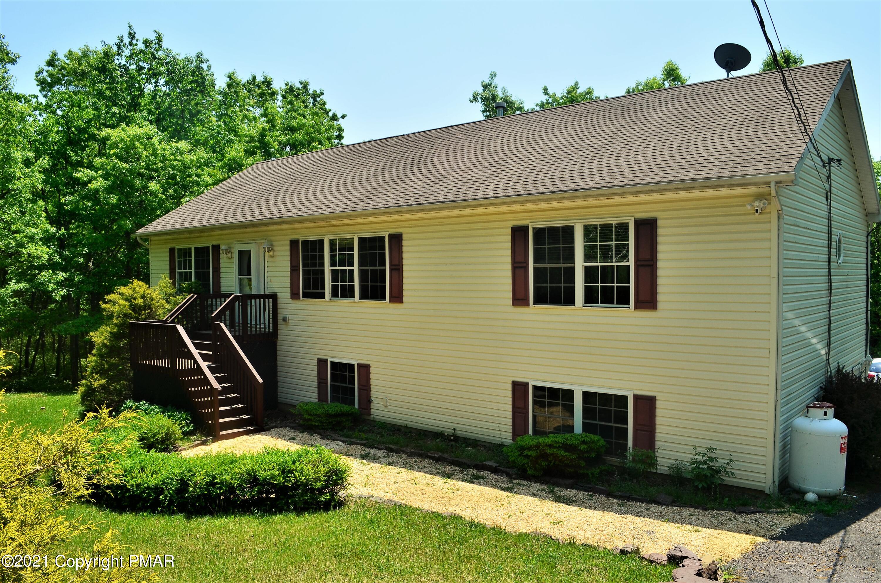 218 Nosirrah Road Albrightsville, PA 18210 - Photo 1 of 32 a front view of a house with a yard