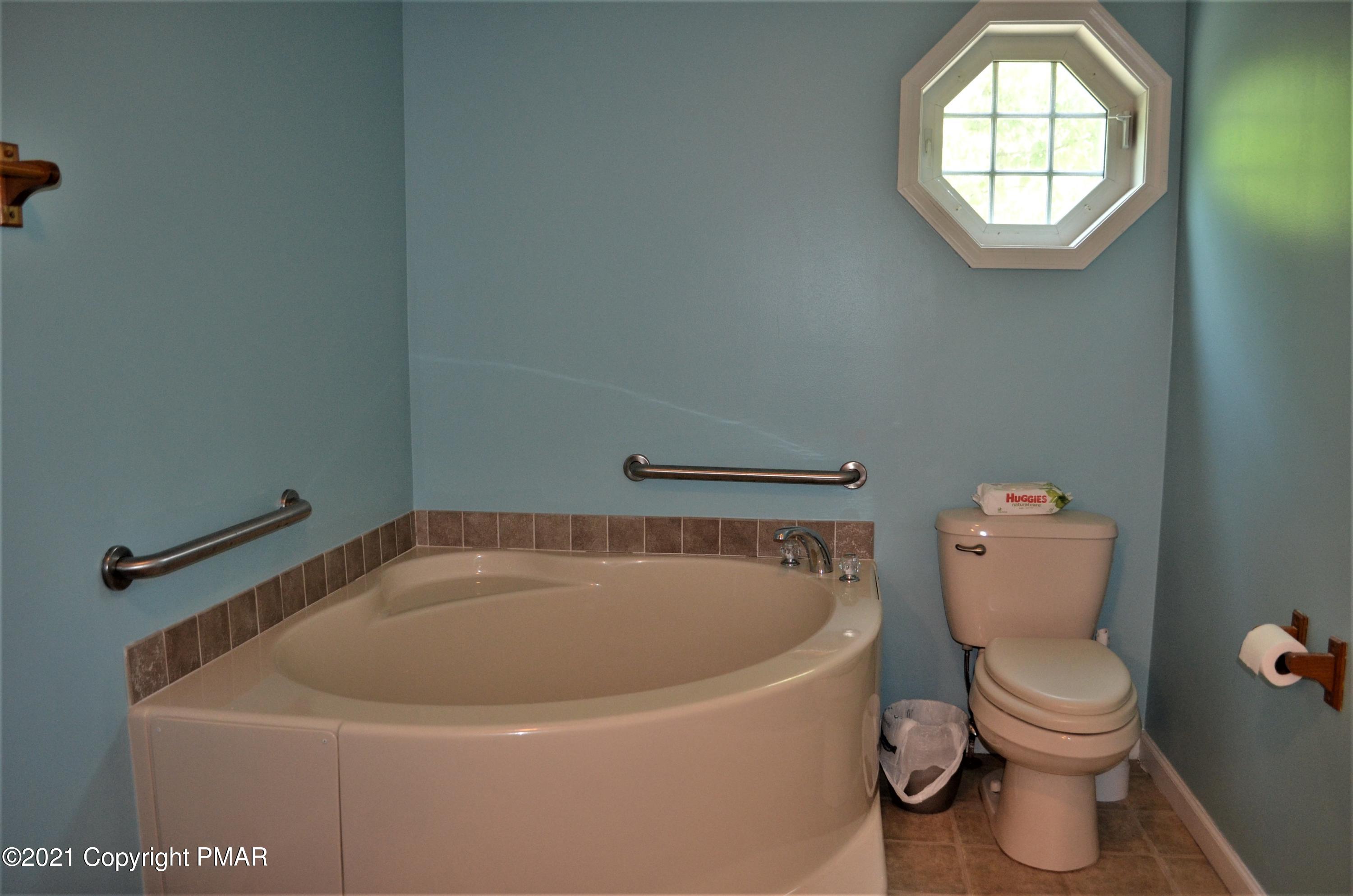 218 Nosirrah Road Albrightsville, PA 18210 - Photo 15 of 32 a bathroom with a toilet and a window