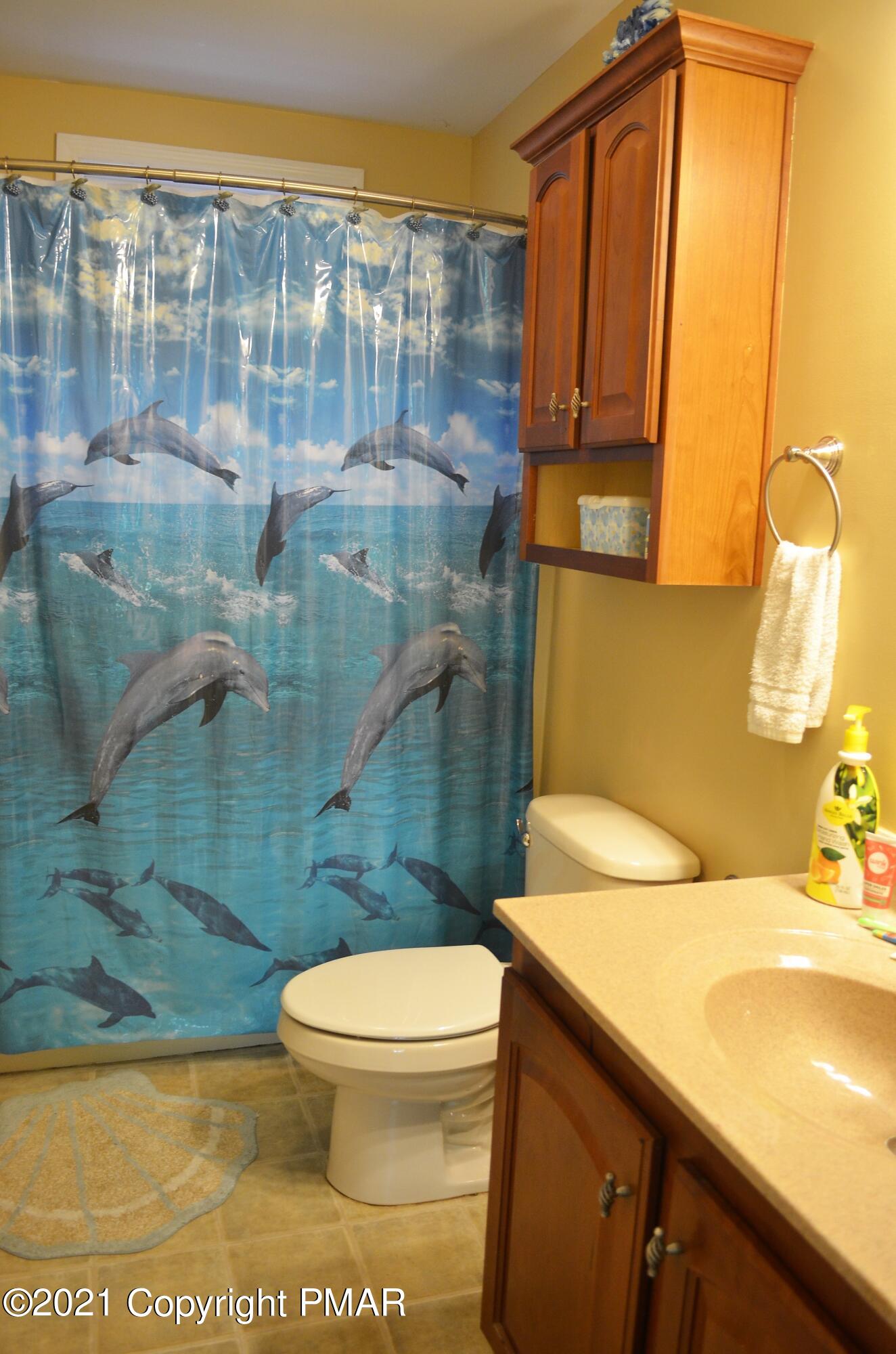 218 Nosirrah Road Albrightsville, PA 18210 - Photo 17 of 32 a bathroom with a sink toilet and shower