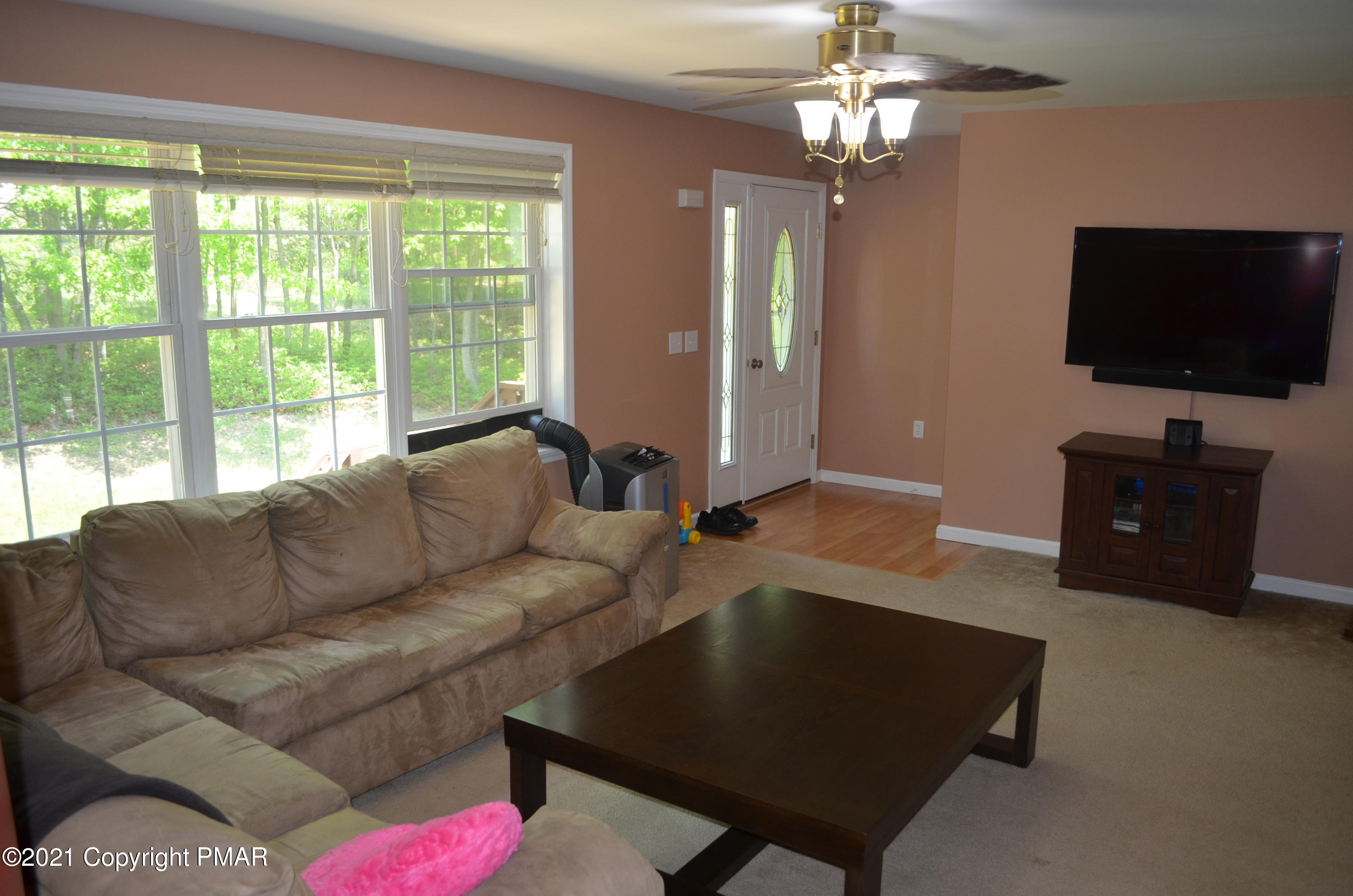 218 Nosirrah Road Albrightsville, PA 18210 - Photo 3 of 32 a living room with furniture and a flat screen tv