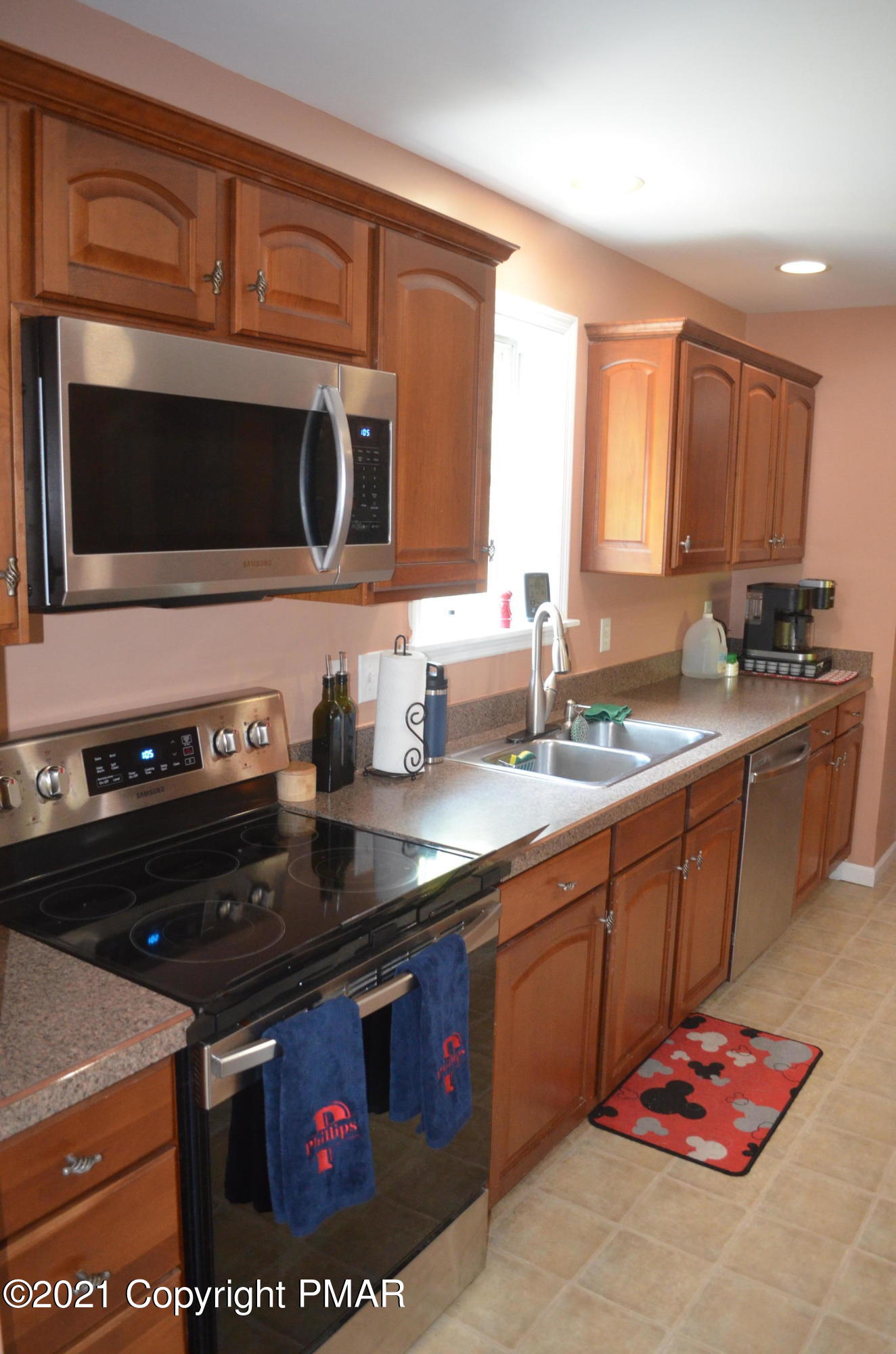 218 Nosirrah Road Albrightsville, PA 18210 - Photo 7 of 32 a kitchen with stainless steel appliances a sink stove and microwave