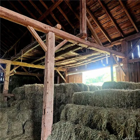 a living room with a couch and a stove