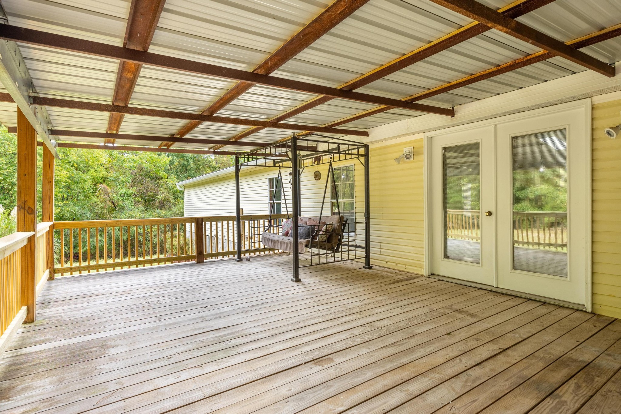 339 Oak Tree Road Ringgold, GA 30736 - Photo 14 of 31 a view of a patio with wooden floor