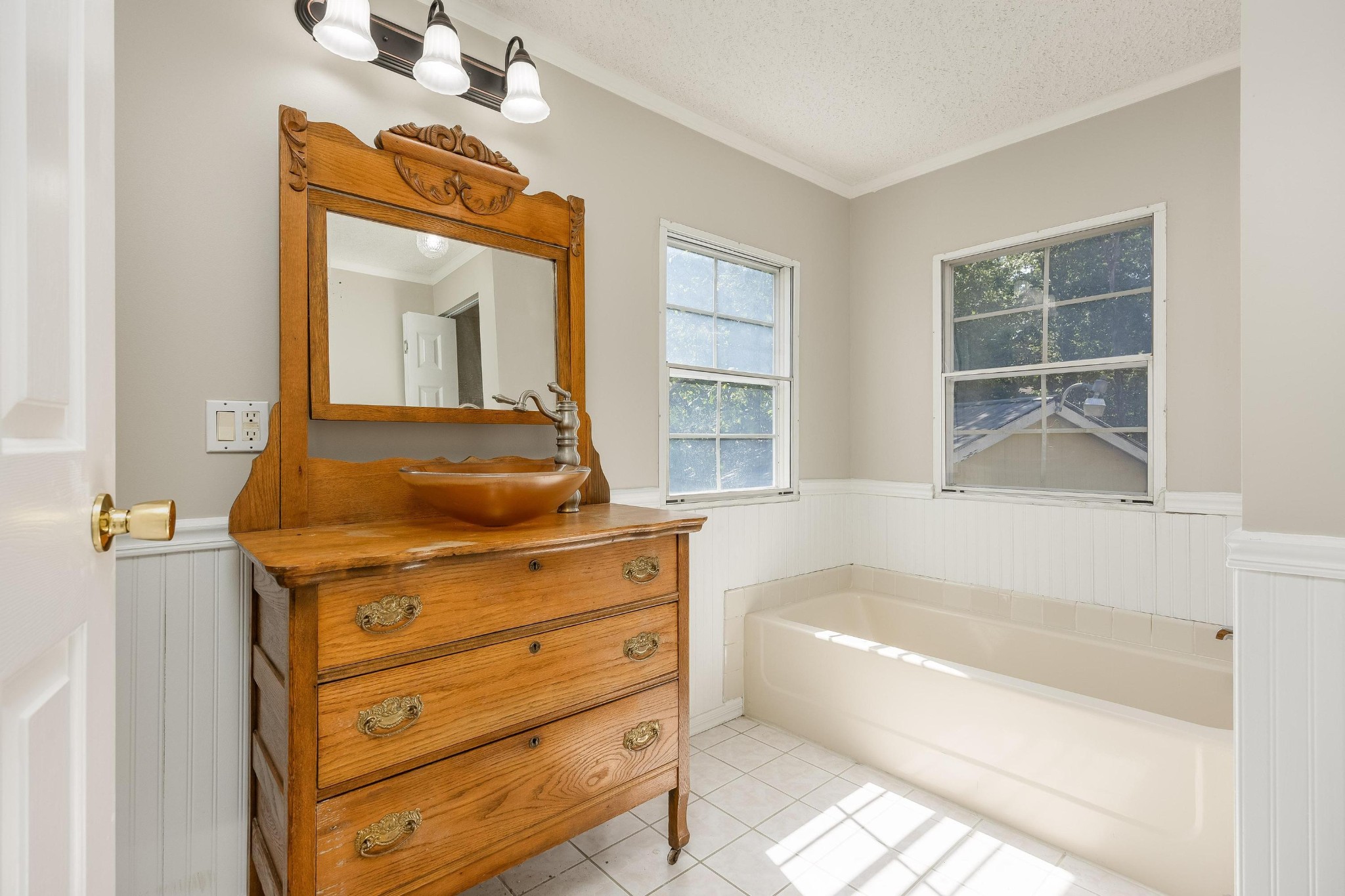 339 Oak Tree Road Ringgold, GA 30736 - Photo 20 of 31 a bathroom with a tub sink and mirror