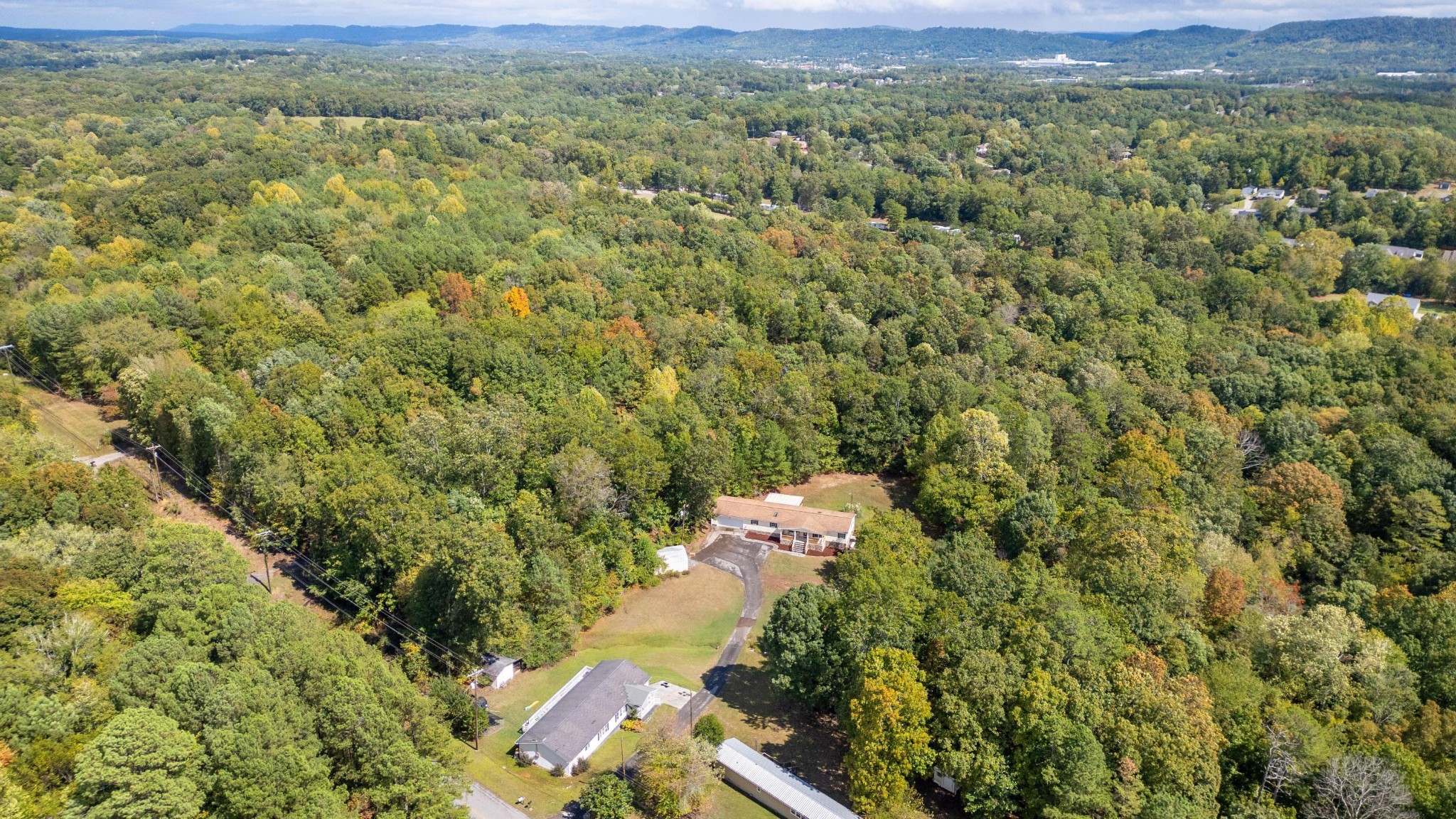 339 Oak Tree Road Ringgold, GA 30736 - Photo 25 of 31 a view of a city with lush green forest