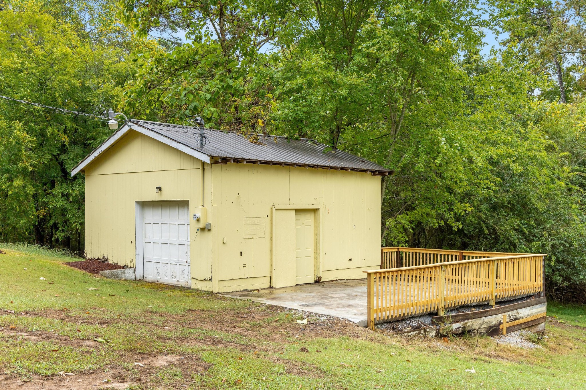 339 Oak Tree Road Ringgold, GA 30736 - Photo 26 of 31 a view of a wooden house with a yard