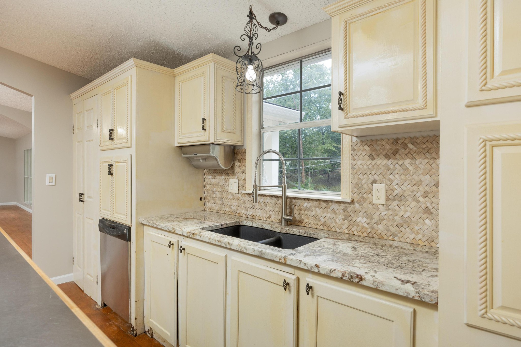 339 Oak Tree Road Ringgold, GA 30736 - Photo 10 of 31 a kitchen with a sink and cabinets