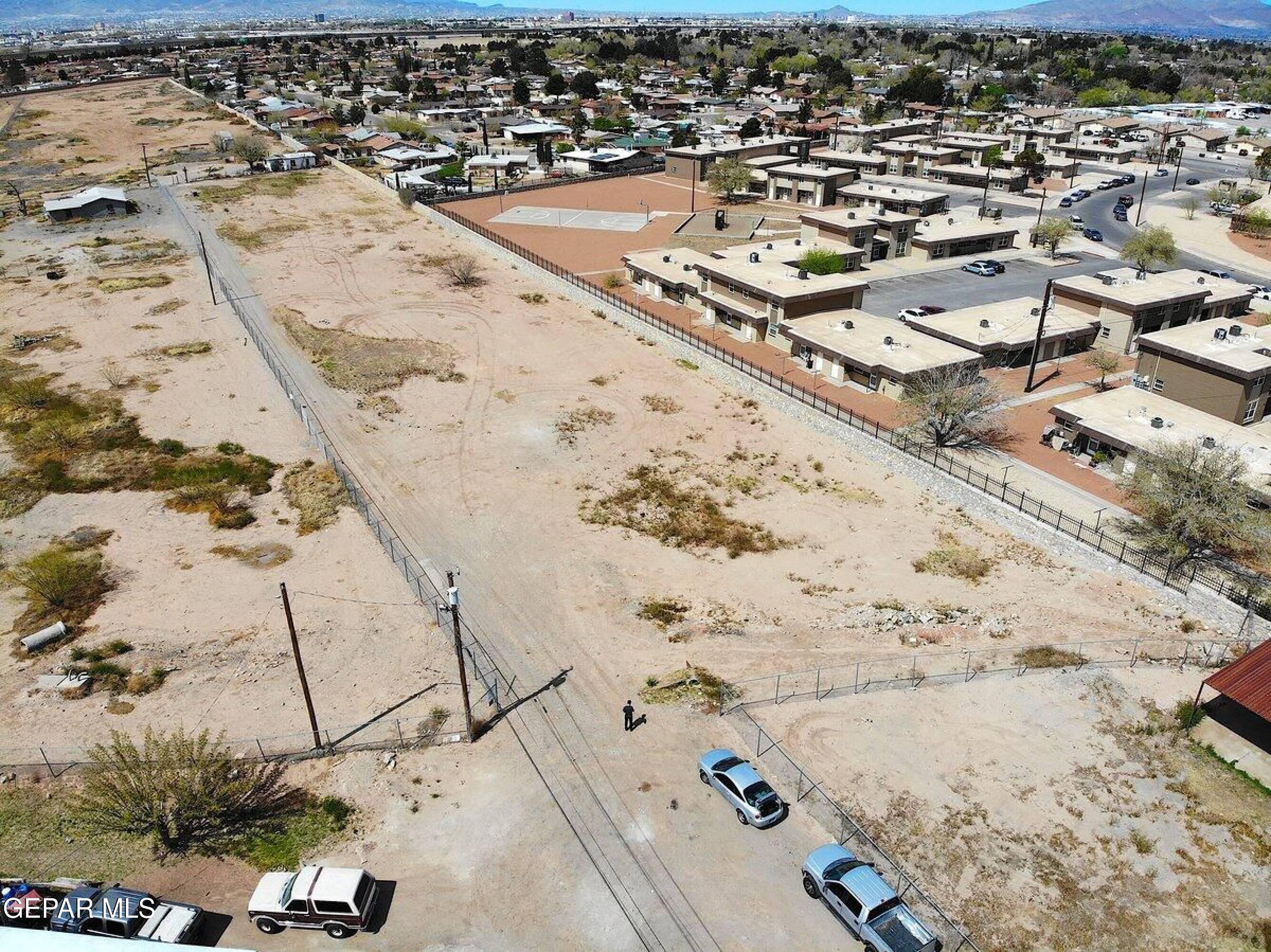 8482 Alameda El Paso, TX 79907 - Photo 4 of 6 an aerial view of residential houses with outdoor space