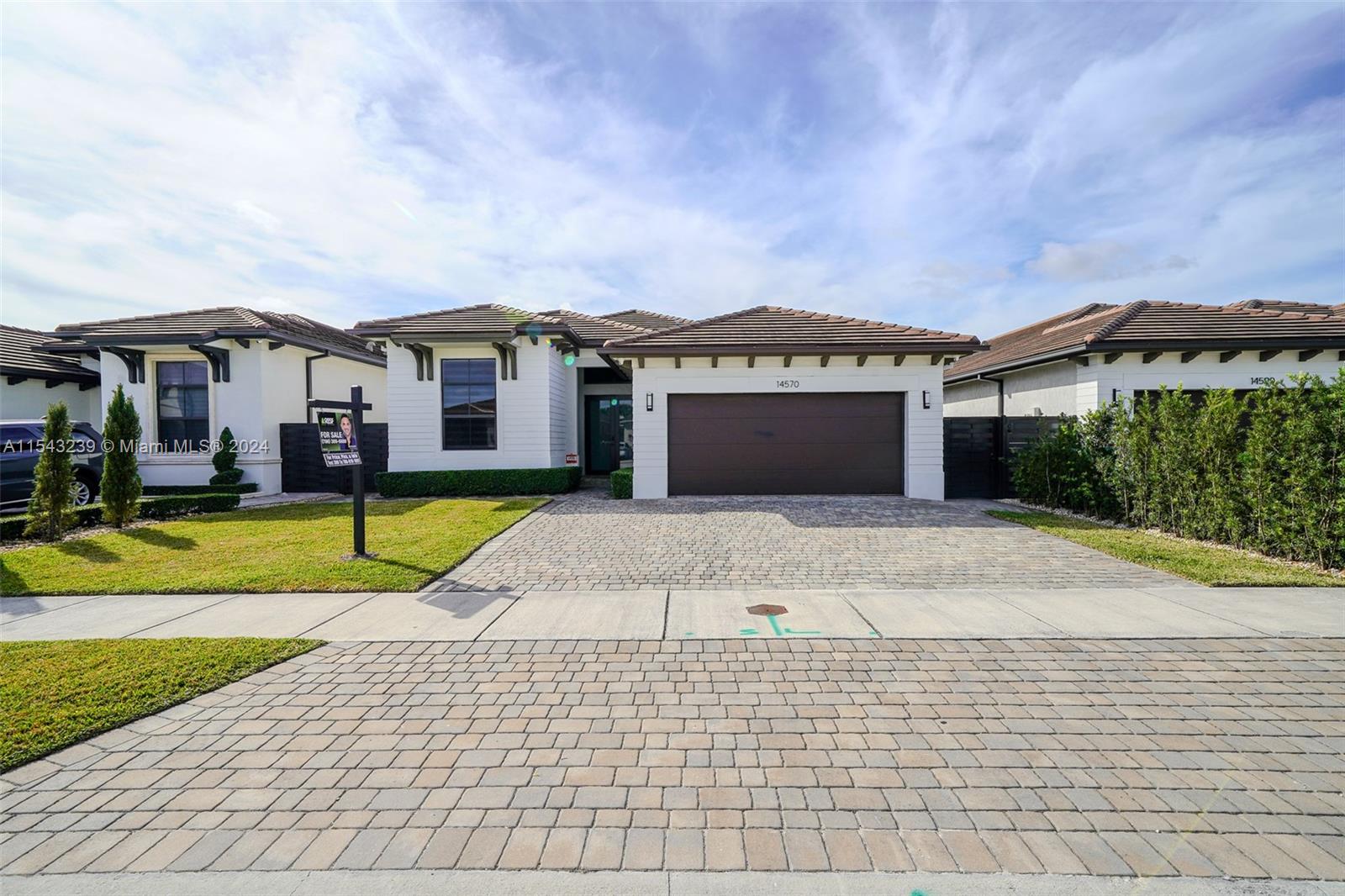 14570 Southwest 19th Street Miami, FL 33175 - Photo 1 of 30 a view of a house with swimming pool and a yard