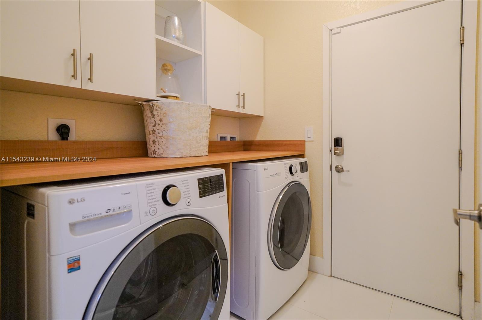 14570 Southwest 19th Street Miami, FL 33175 - Photo 12 of 30 a utility room with dryer and washer