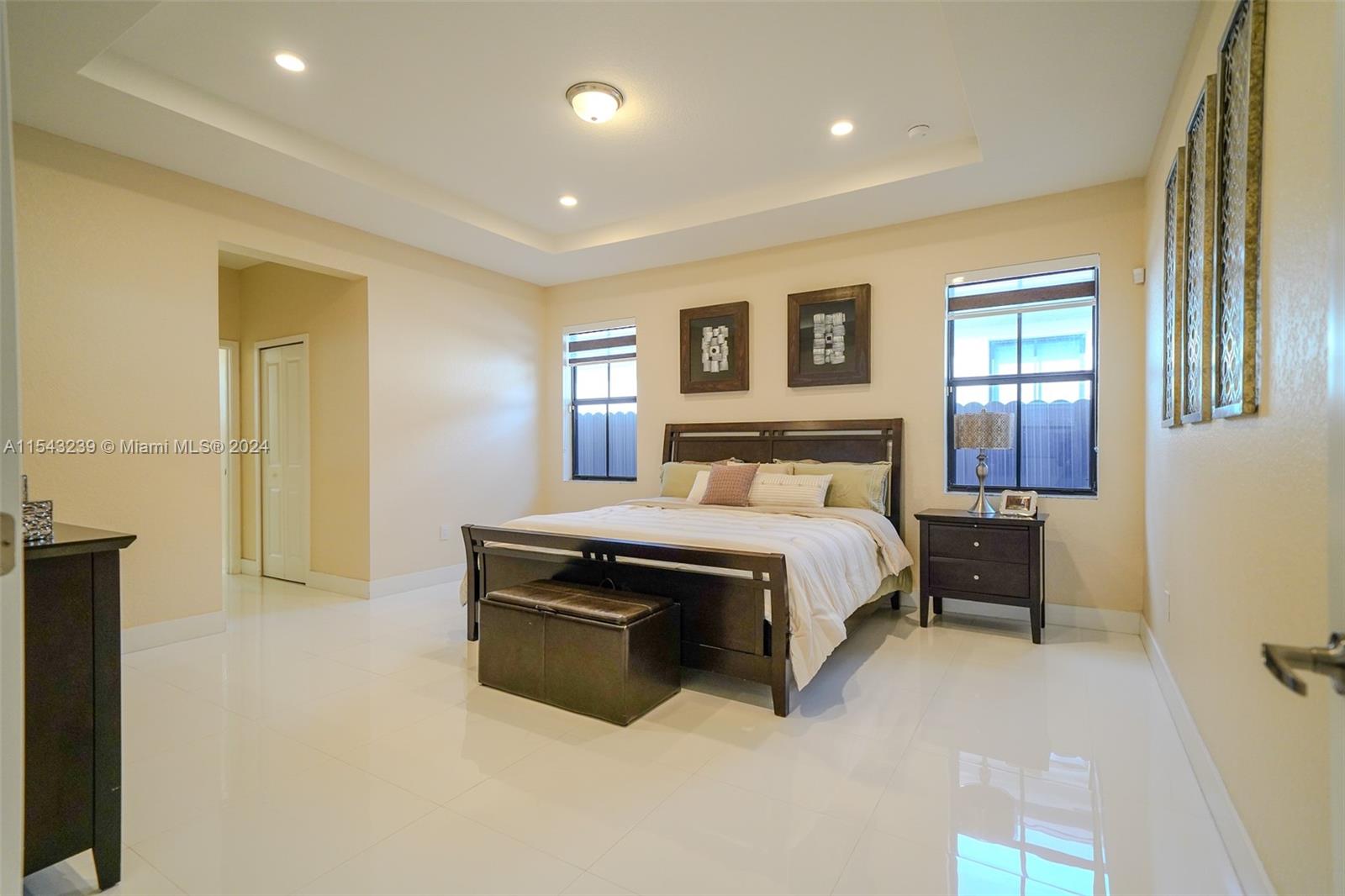 14570 Southwest 19th Street Miami, FL 33175 - Photo 13 of 30 a bedroom with a bed and a couch