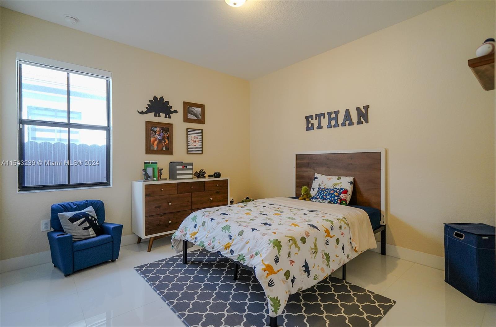 14570 Southwest 19th Street Miami, FL 33175 - Photo 16 of 30 a bedroom with a bed and wooden floor