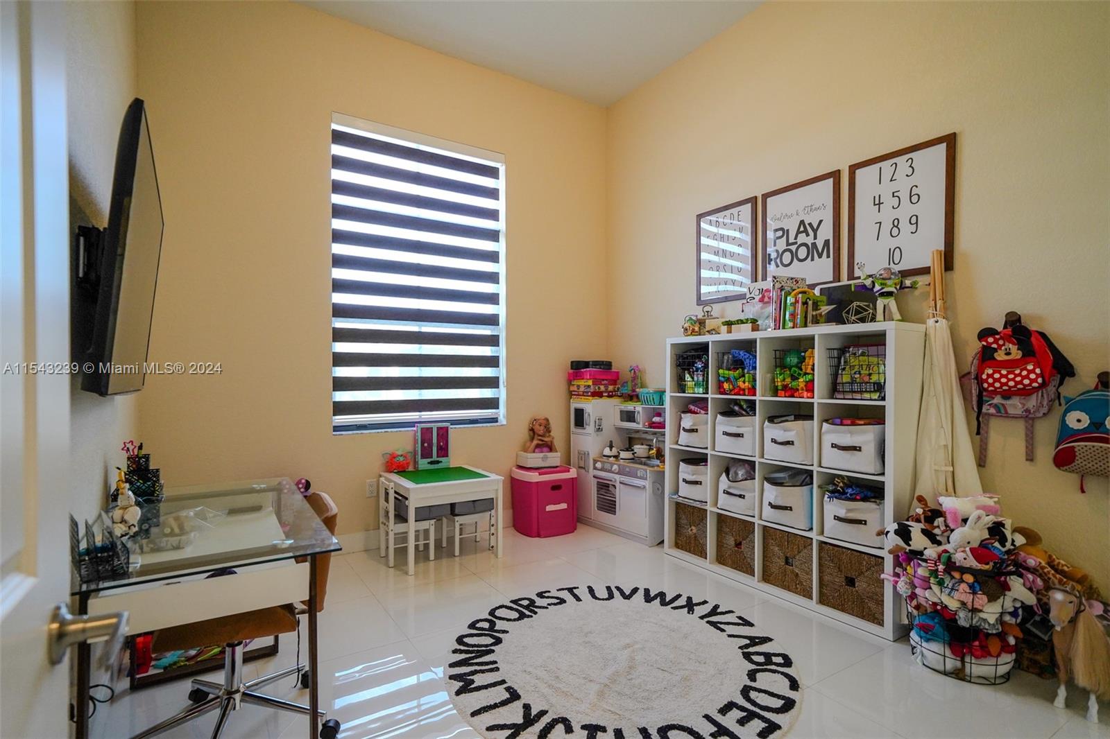 14570 Southwest 19th Street Miami, FL 33175 - Photo 18 of 30 a dining room with furniture and a window