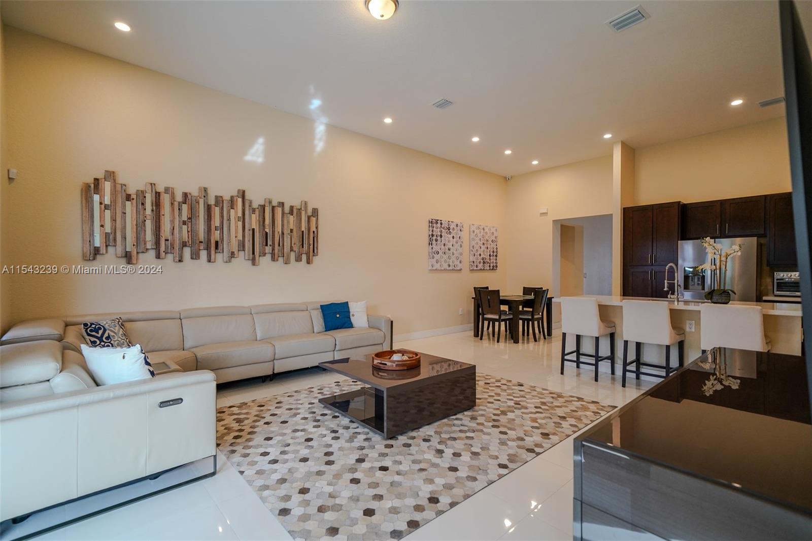 14570 Southwest 19th Street Miami, FL 33175 - Photo 3 of 30 a living room with lots of furniture and a couch