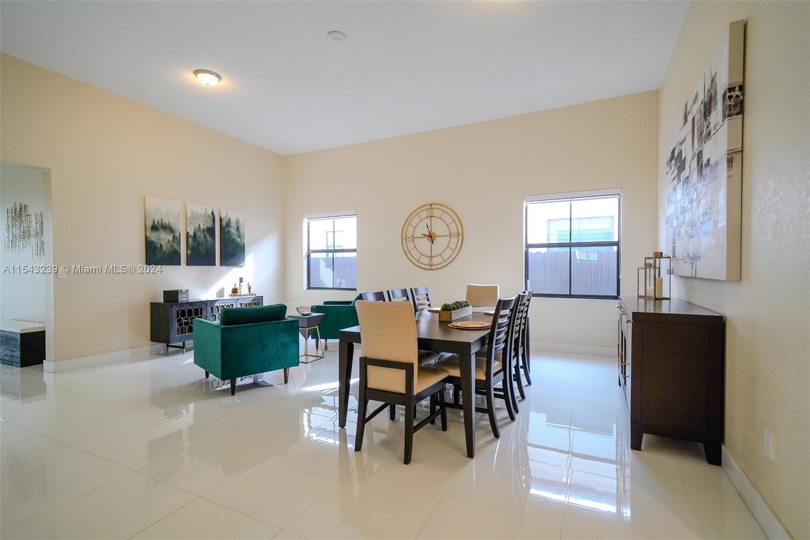 14570 Southwest 19th Street Miami, FL 33175 - Photo 8 of 30 a view of a dining room with furniture and a large window