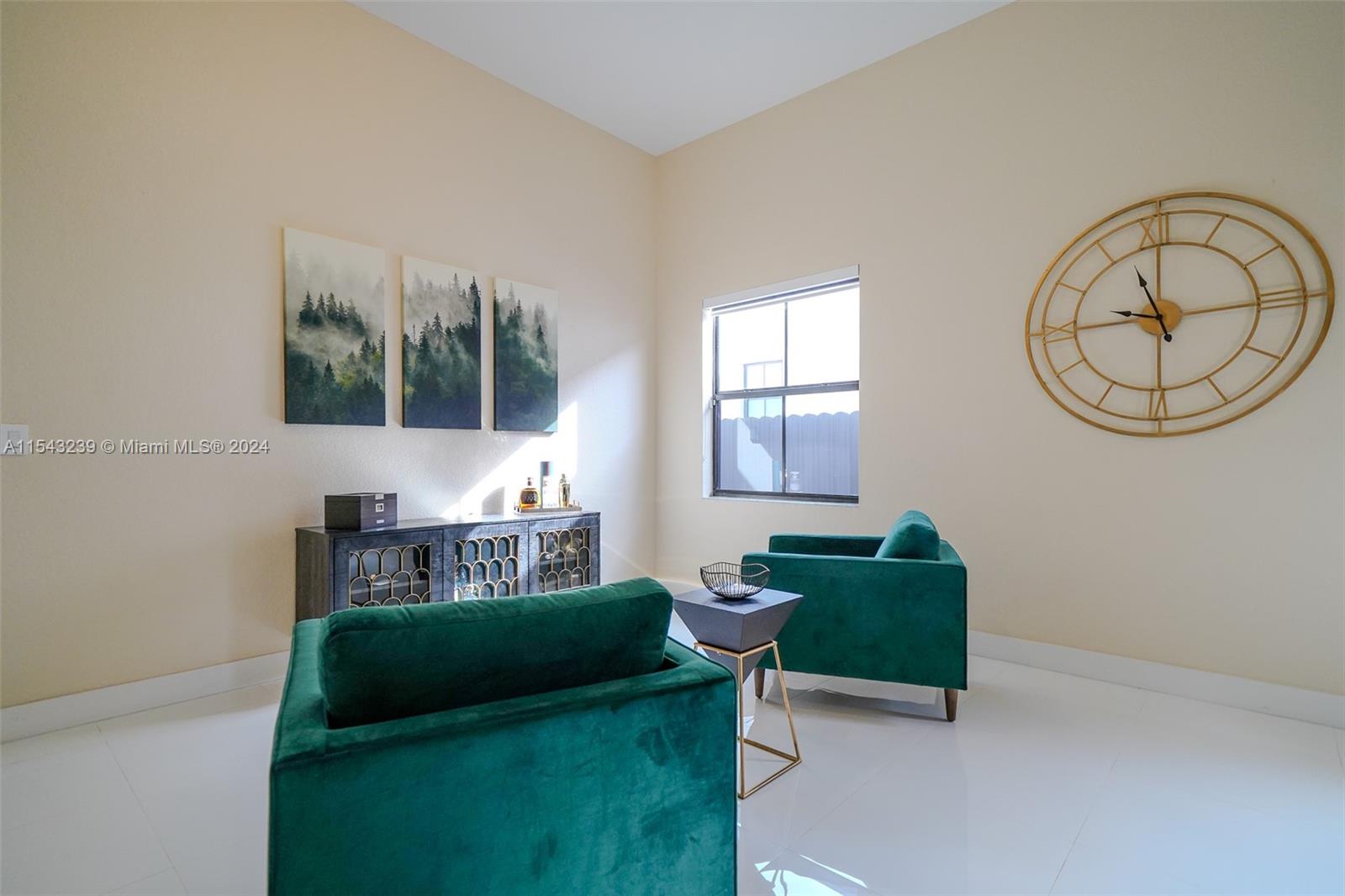 14570 Southwest 19th Street Miami, FL 33175 - Photo 9 of 30 a living room with furniture and a window