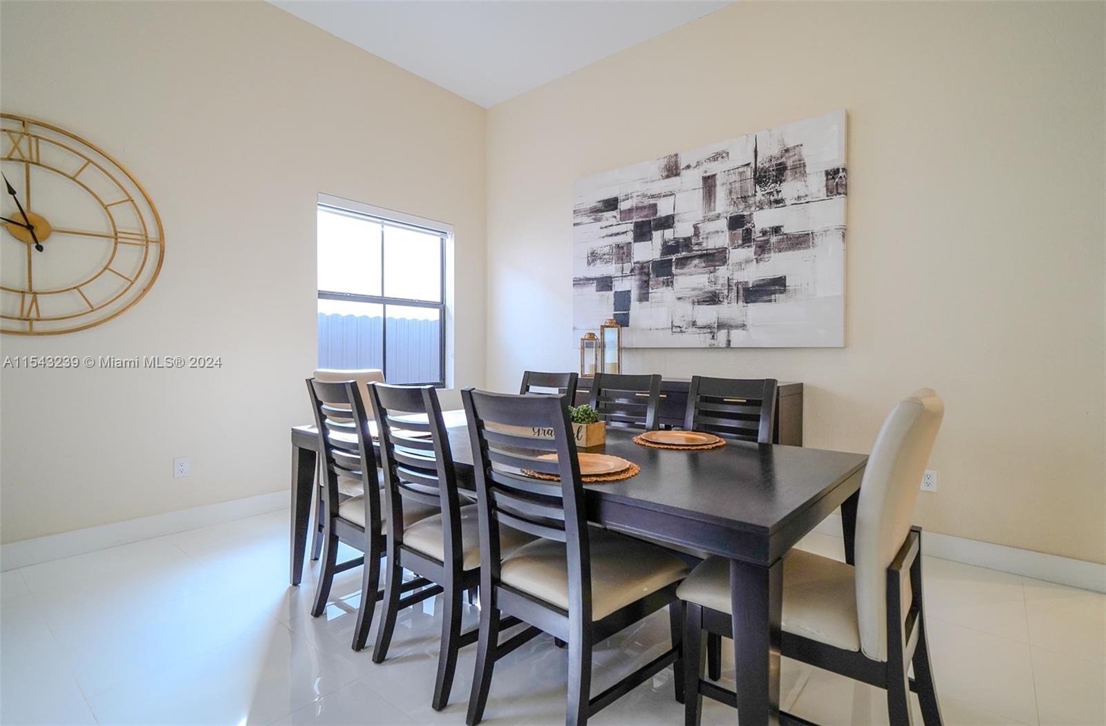 14570 Southwest 19th Street Miami, FL 33175 - Photo 10 of 30 a view of a dining room with furniture and chandelier