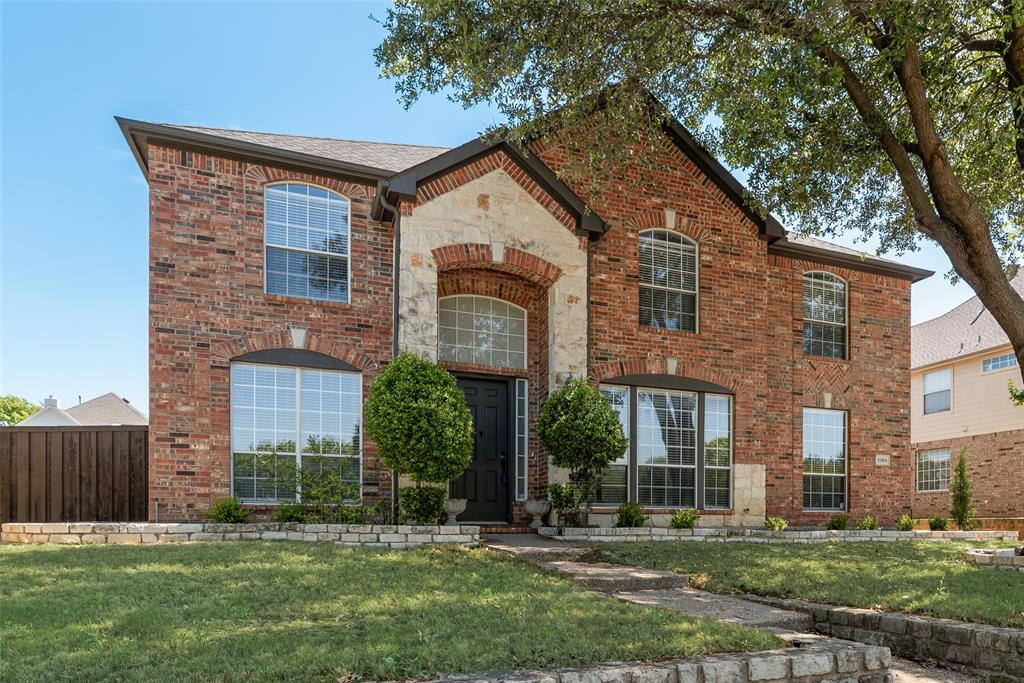 View of front of property featuring brick siding