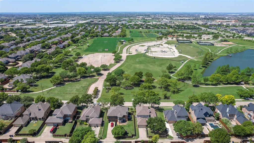 11104 Rogers Road Frisco, TX 75033 - Photo 40 of 40 Aerial view of property's location featuring a nearby body of water and nearby suburban area