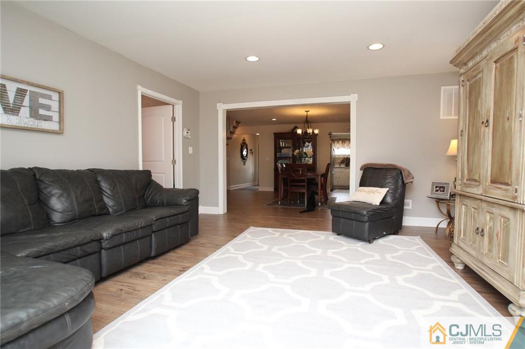 16 Ridge Road Old Bridge, NJ 08857 - Photo 2 of 22 a living room with furniture and a couch