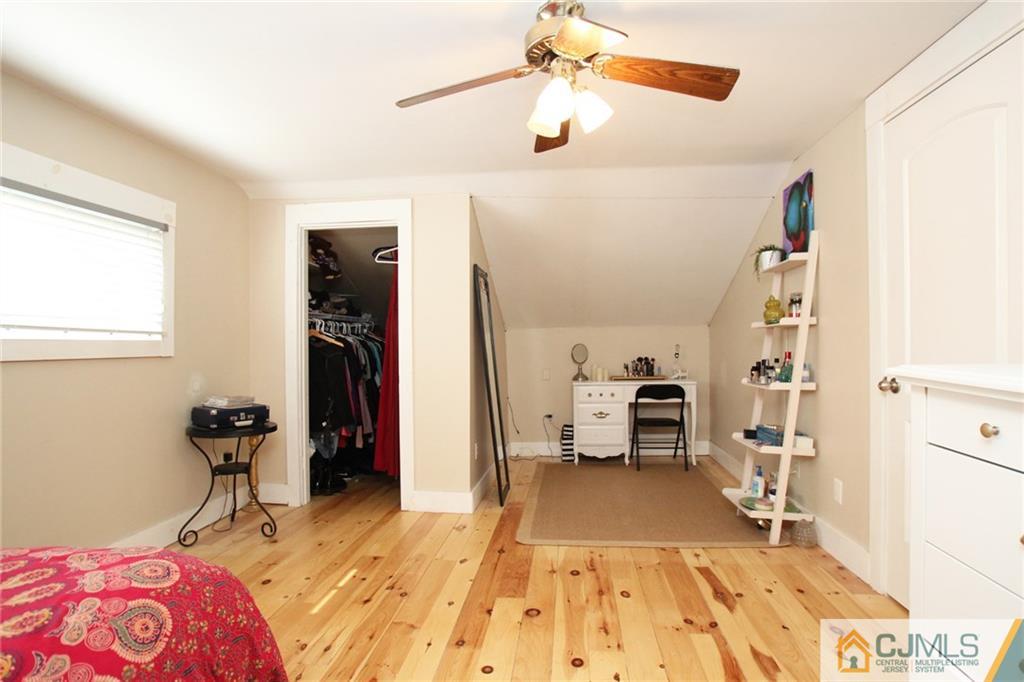 16 Ridge Road Old Bridge, NJ 08857 - Photo 12 of 22 a bedroom with furniture and a window
