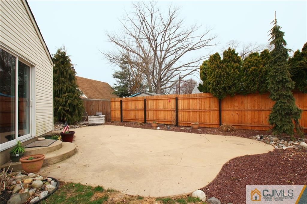 16 Ridge Road Old Bridge, NJ 08857 - Photo 20 of 22 a view of a backyard of the house