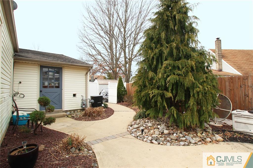 16 Ridge Road Old Bridge, NJ 08857 - Photo 21 of 22 a house view with a backyard space