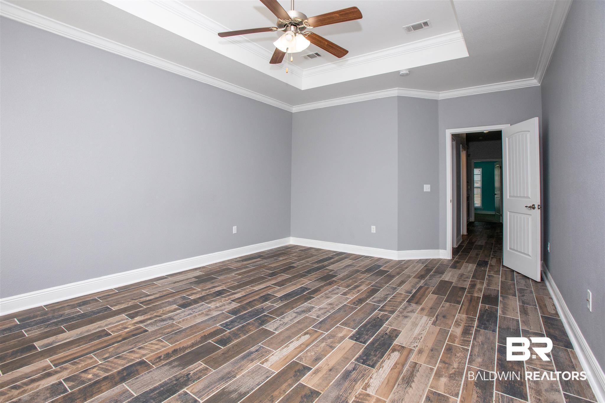 7029 Rocky Rd Loop Gulf Shores, AL 36542 - Photo 29 of 43 Master Bedroom