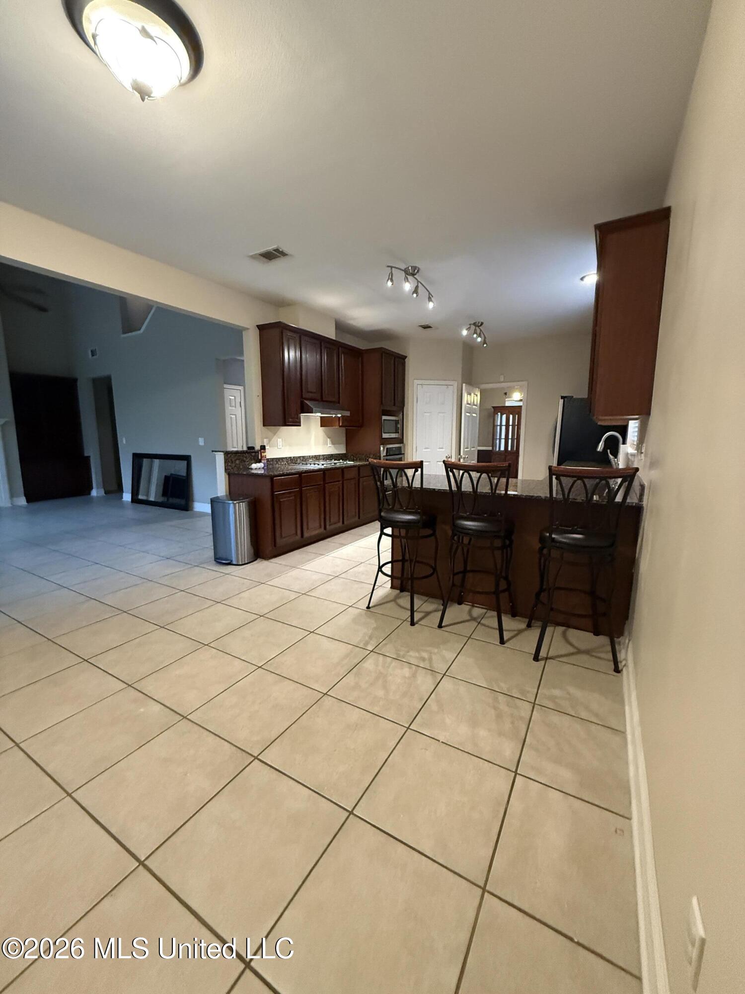 7709 Clamshell Avenue Ocean Springs, MS 39564 - Photo 8 of 19 20260606_154829502_iOS