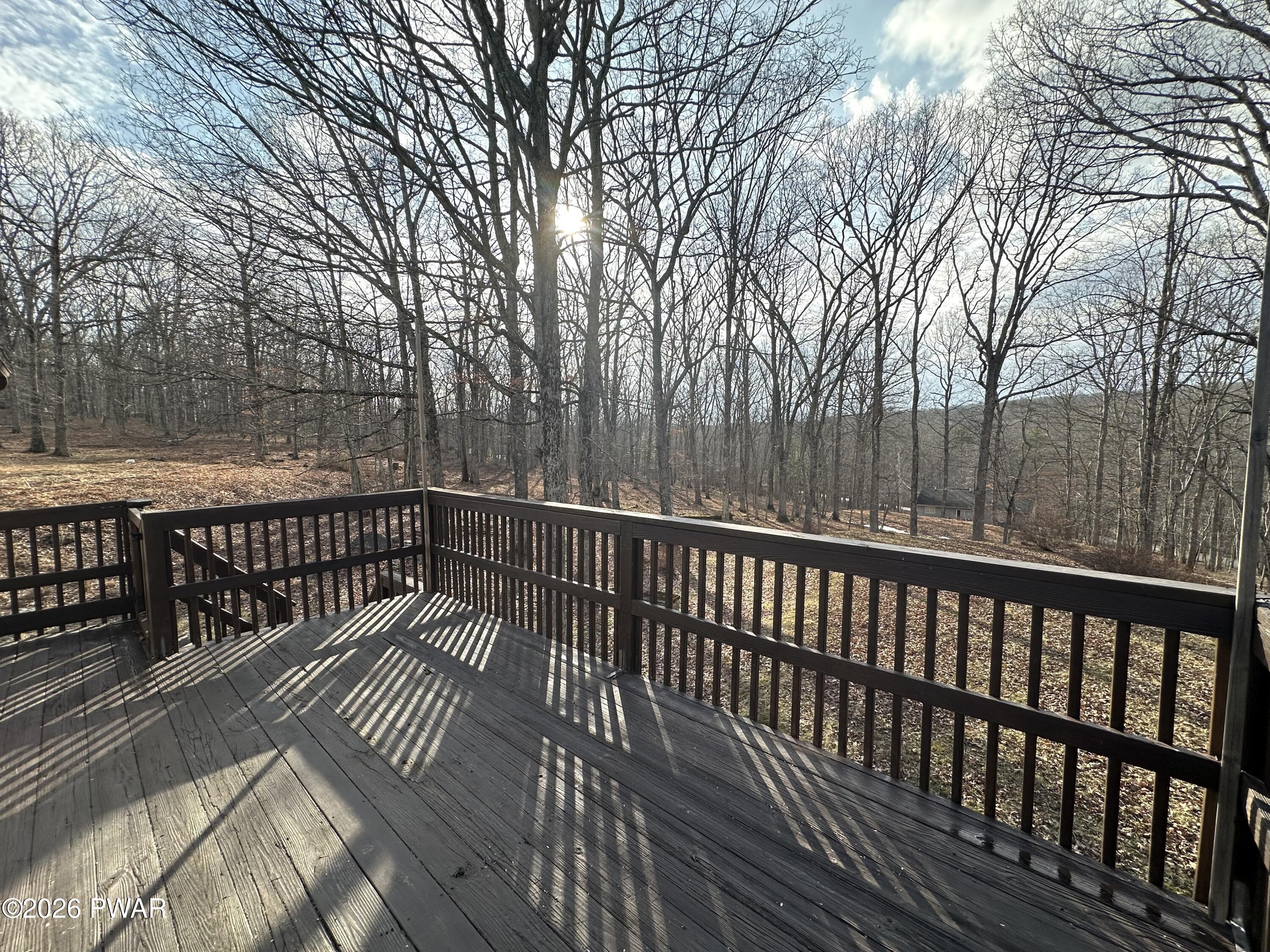 2116 Spring Drive Bushkill, PA 18324 - Photo 6 of 19 a view of balcony with wooden floor