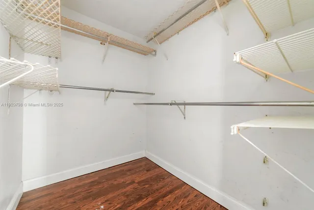 a view of a room with racks on the wall