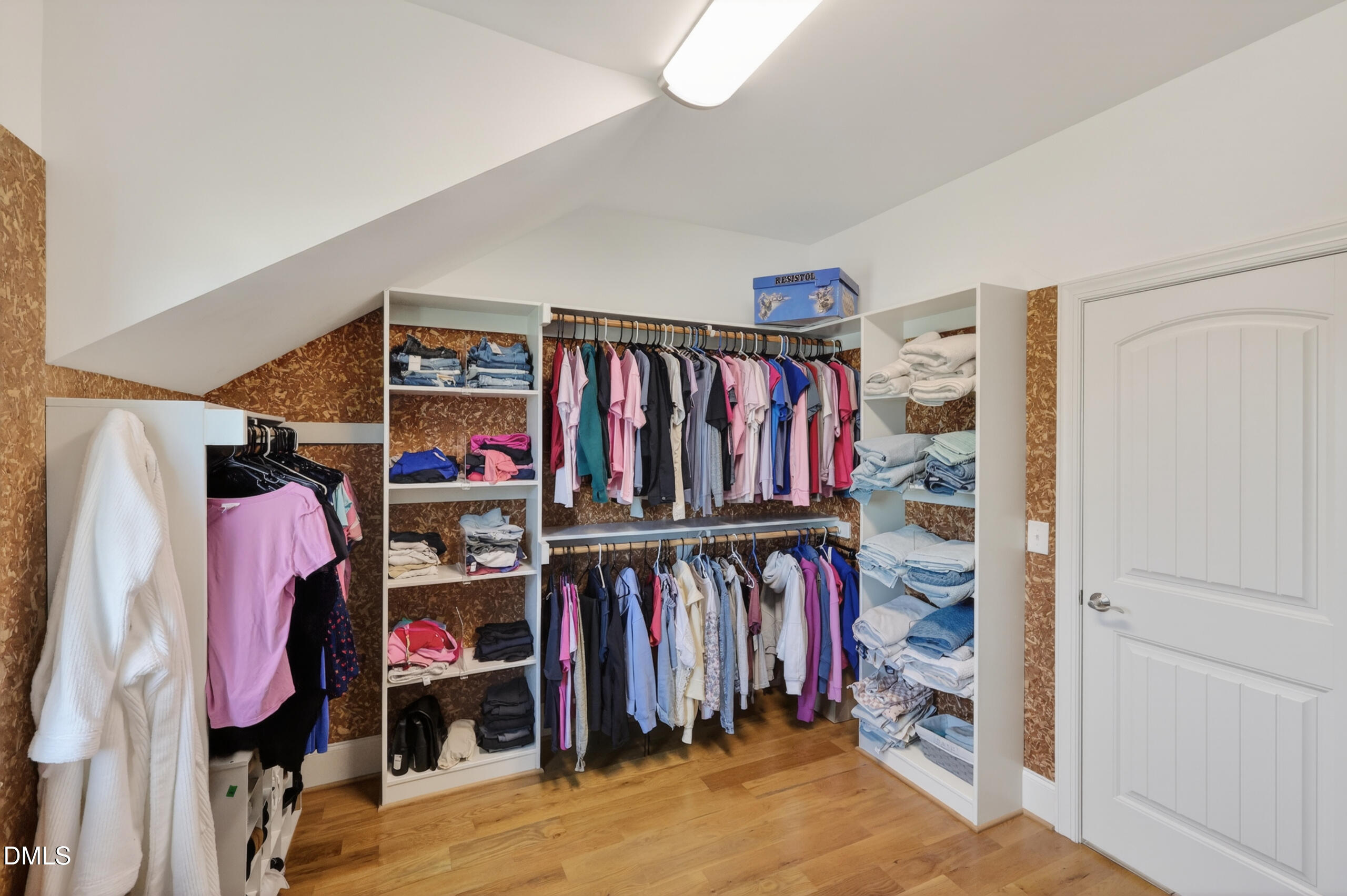 261 Character Drive Rolesville, NC 27571 - Photo 41 of 77 a view of walk in closet with clothes