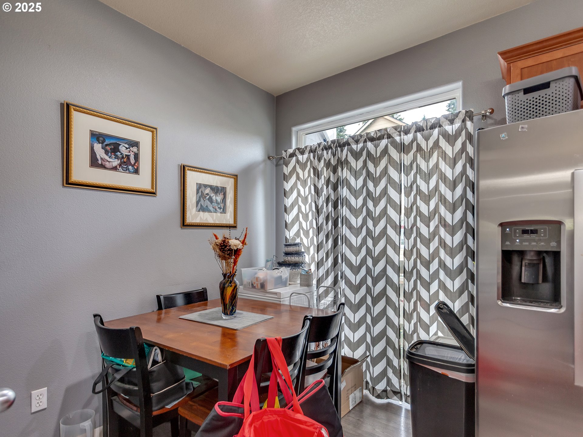 7817 Southwest Brookline Lane Portland, OR 97224 - Photo 11 of 13 a view of a workspace with furniture and a window