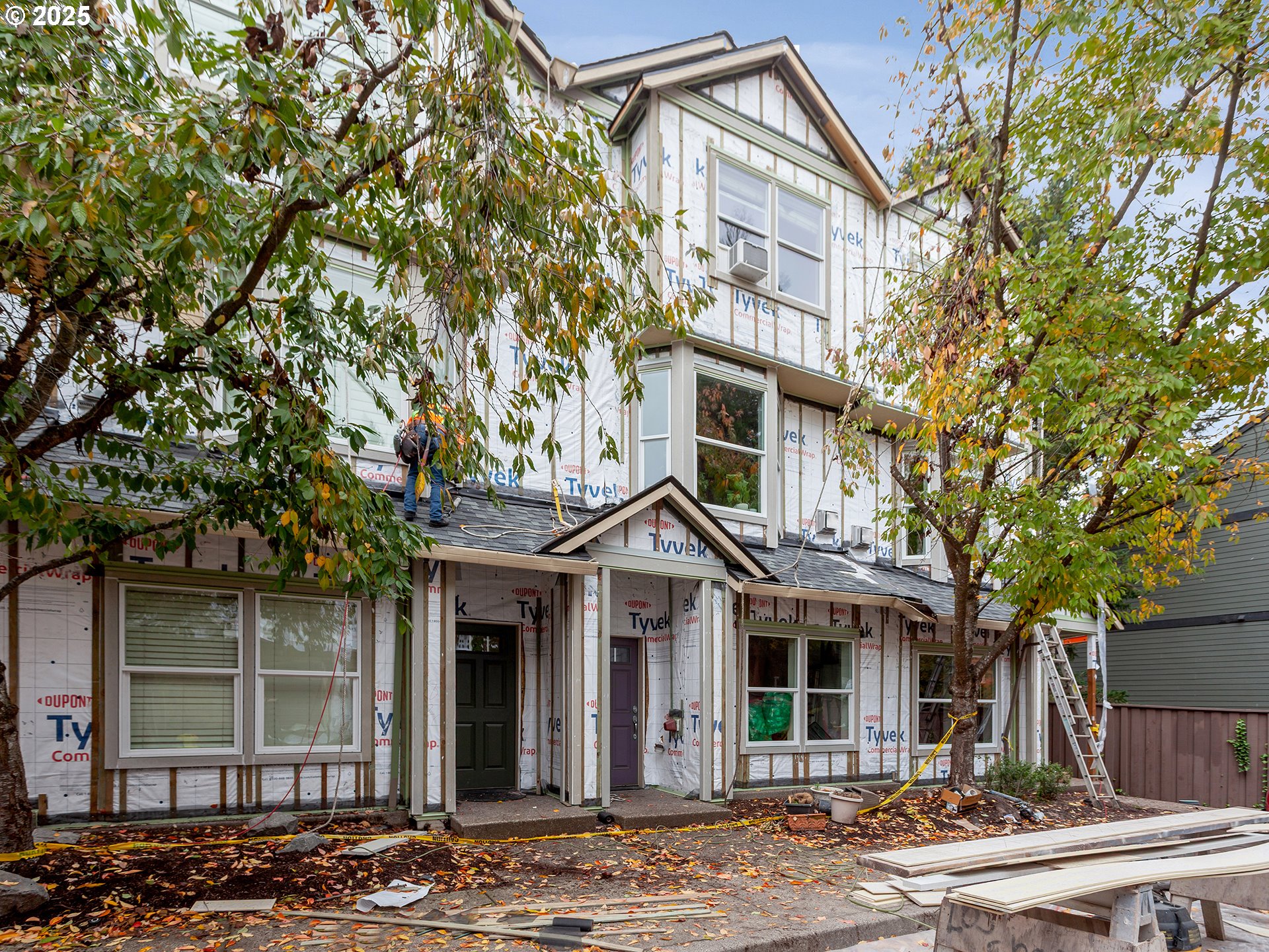 7817 Southwest Brookline Lane Portland, OR 97224 - Photo 2 of 13 a front view of a house with a tree