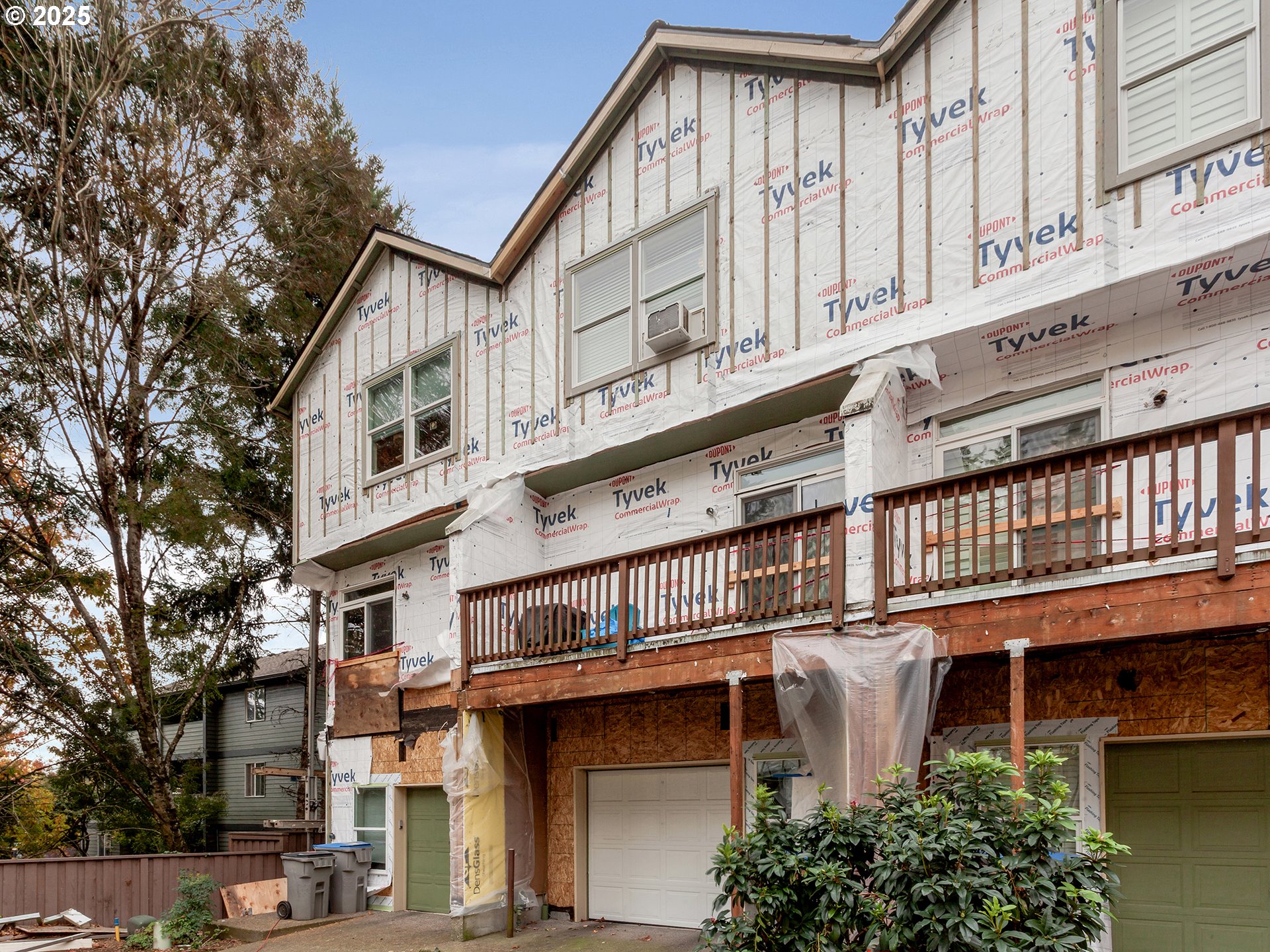 7817 Southwest Brookline Lane Portland, OR 97224 - Photo 3 of 13 a view of a building with a balcony