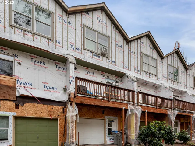 a view of a building with a street