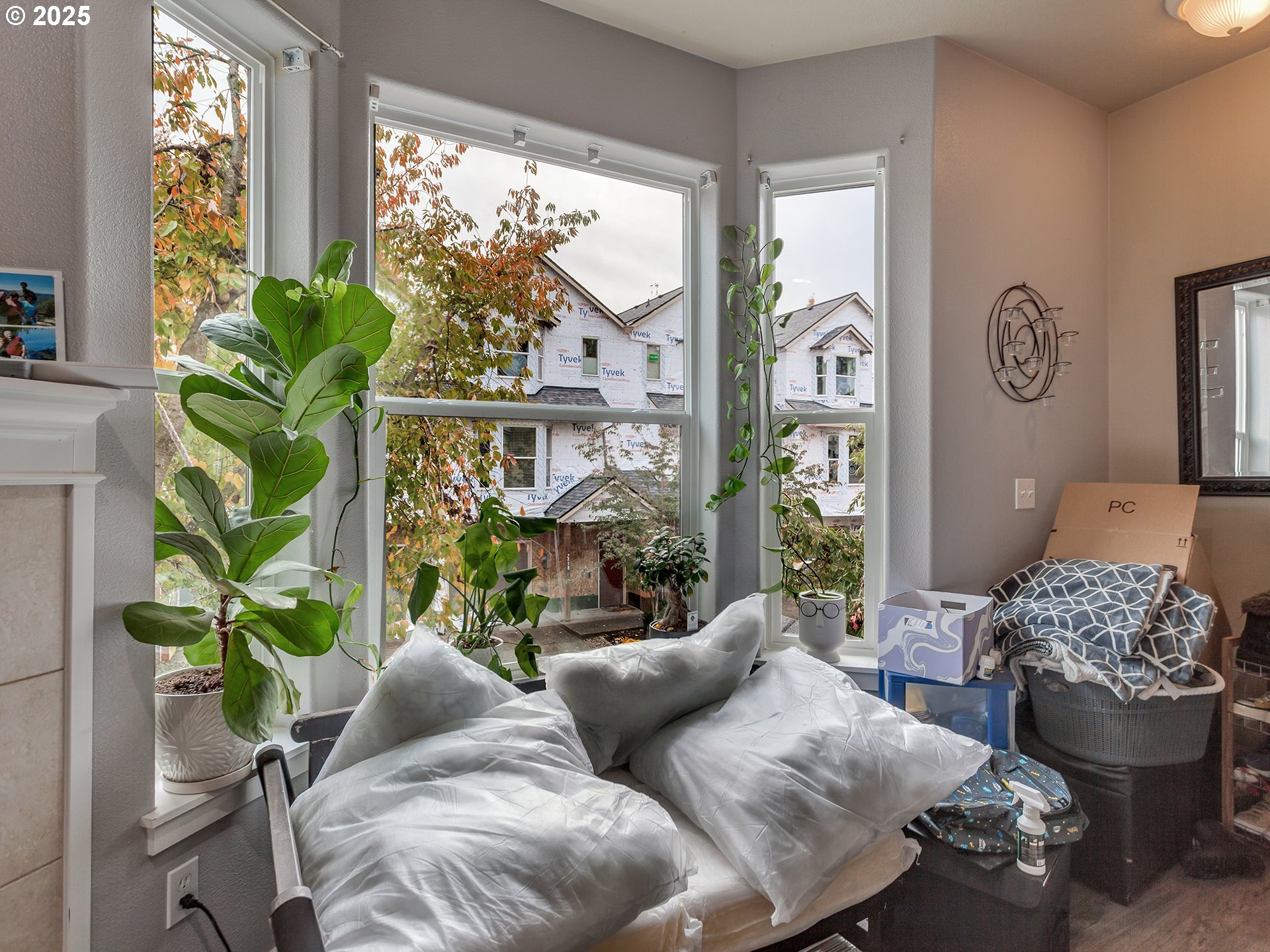 7817 Southwest Brookline Lane Portland, OR 97224 - Photo 7 of 13 a living room with patio furniture and a potted plant