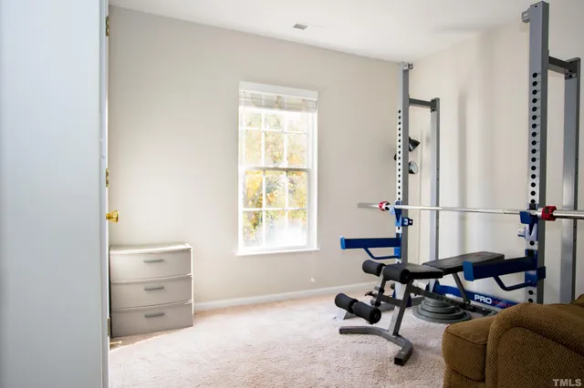 a room with furniture and a window